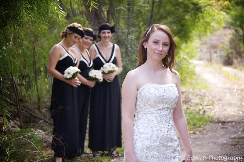 Bride and bridesmaids watching - wedding photography sydney